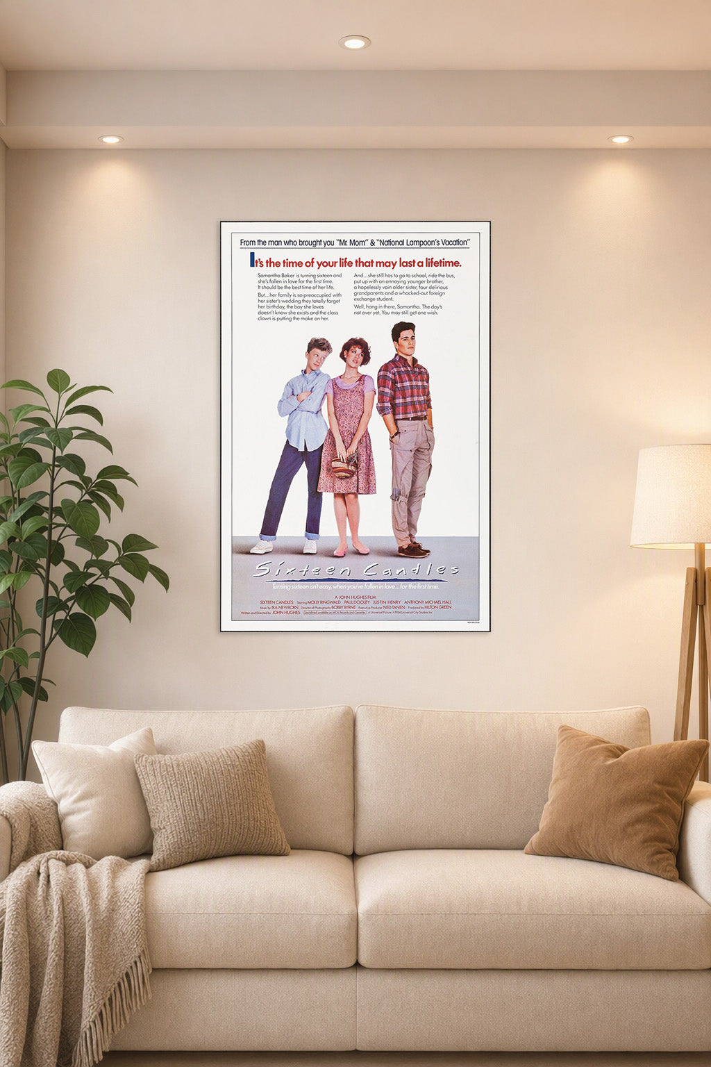 Sixteen Candles Movie Poster in a bright living room above a beige sofa.