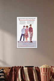 Sixteen Candles Movie Poster in a cozy movie room above a brown sofa with popcorn.