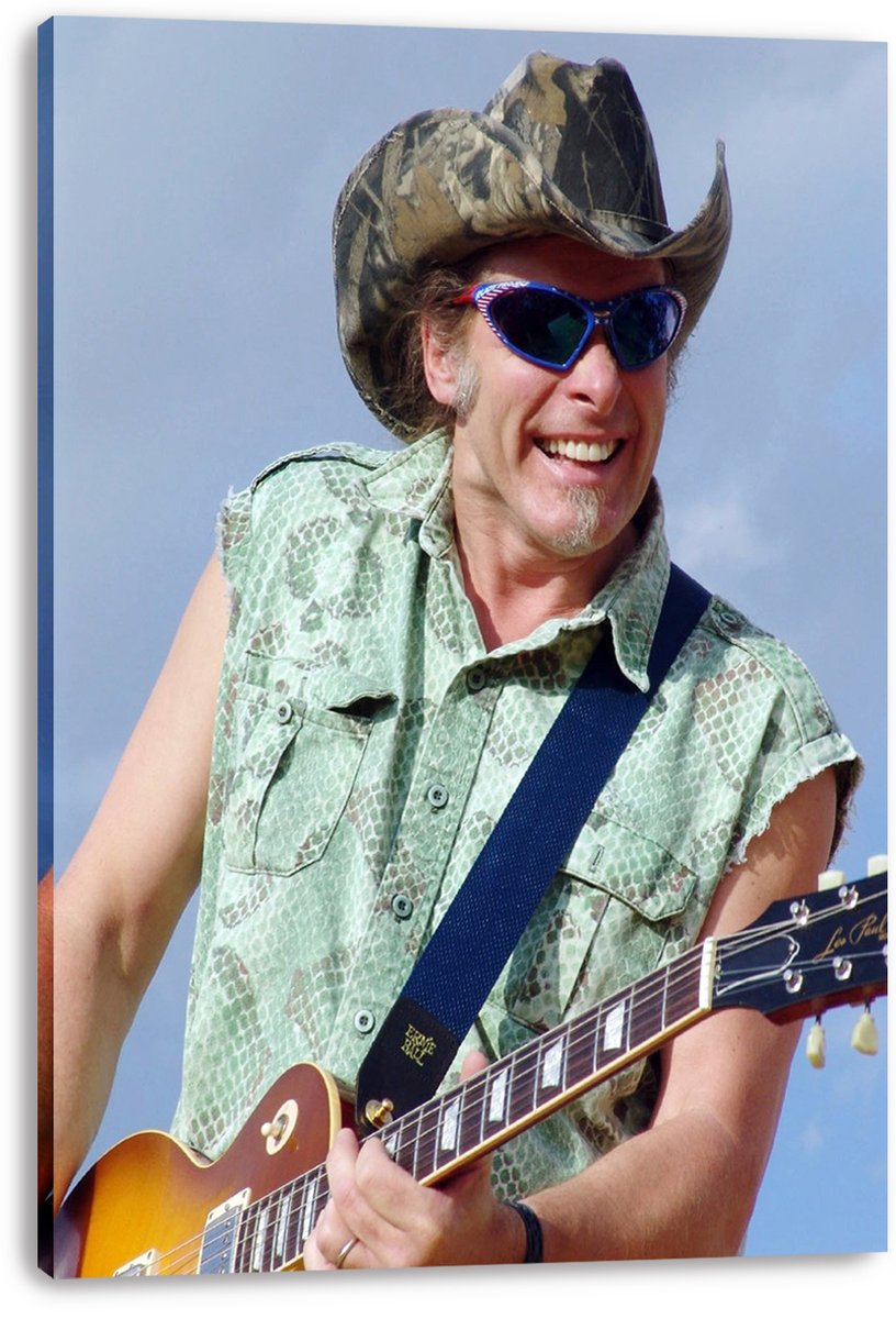 Guitarist canvas wall art print featuring a smiling man in a camouflage cowboy hat and blue sunglasses playing a sunburst electric guitar.