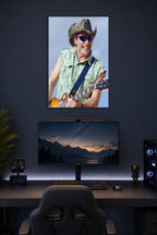 Smiling Guitarist in Cowboy Hat in a gaming desk setup above a monitor.