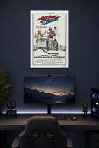 Smokey and the Bandit Movie Poster in a gaming desk setup above a monitor.