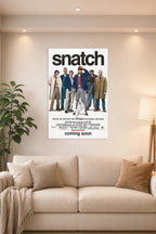 Snatch Movies in a bright living room above a beige sofa.