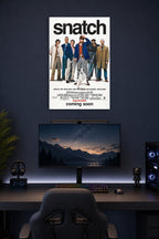 Snatch Movies in a gaming desk setup above a monitor.