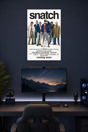 Snatch Movies in a gaming desk setup above a monitor.