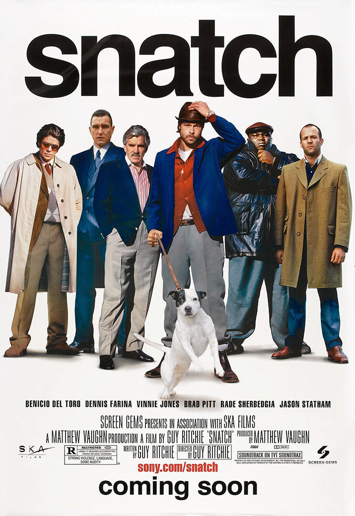 Snatch movie poster with six men in coats and suits standing behind a white dog beneath bold black title text.