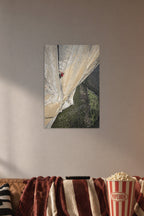 Solo Rock Climber in a cozy movie room above a brown sofa with popcorn.
