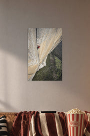 Solo Rock Climber in a cozy movie room above a brown sofa with popcorn.