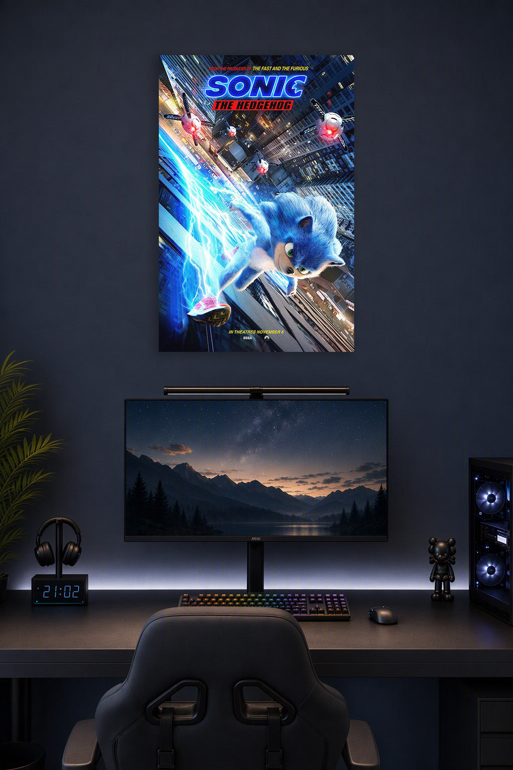 Sonic The Hedgehog in a gaming desk setup above a monitor.