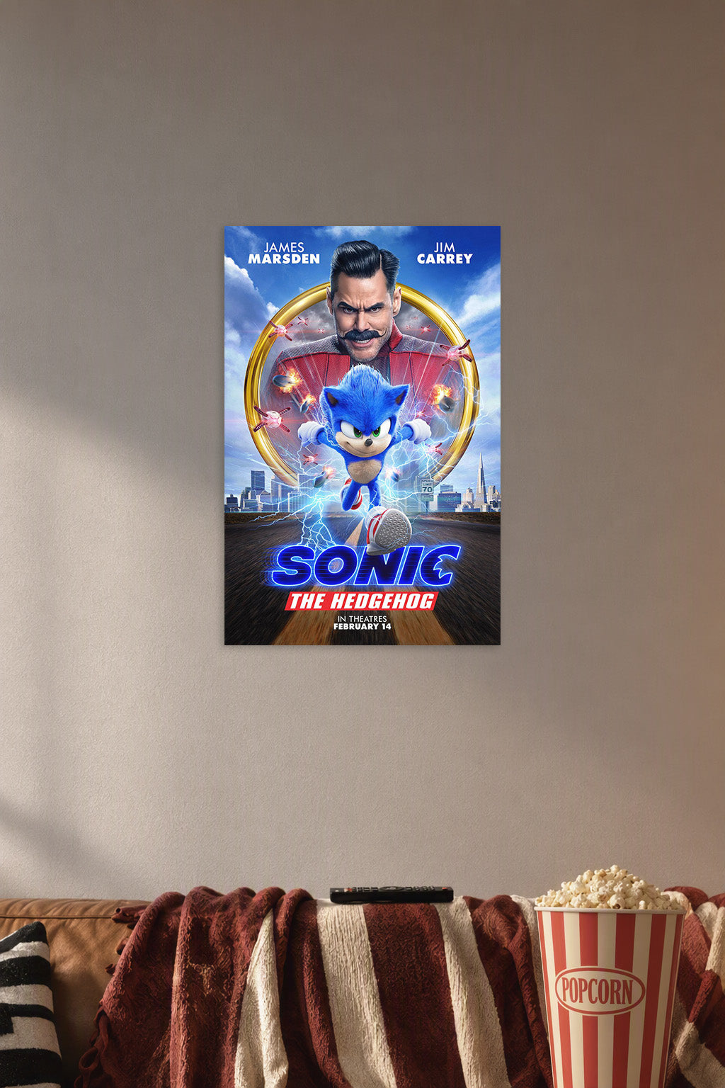 Sonic The Hedgehog Movie in a cozy movie room above a brown sofa with popcorn.