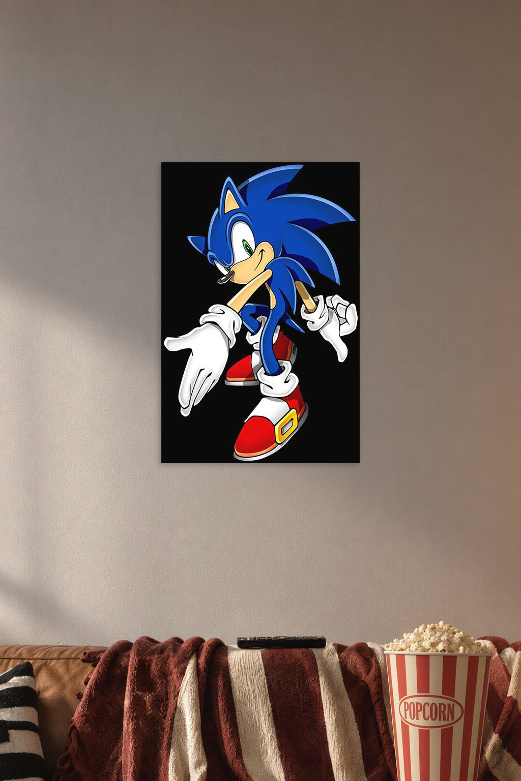 Sonic the Hedgehog in a cozy movie room above a brown sofa with popcorn.