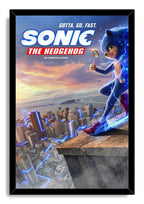 Sonic the Hedgehog framed wall art print depicts the blue hedgehog giving a thumbs-up over a city at sunset with electric blue trails.