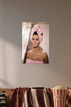 Sophia Loren in a cozy movie room above a brown sofa with popcorn.