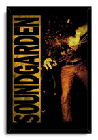 Soundgarden framed wall art print presents an amber-toned vocalist with microphone and bold vertical lettering on a black background.