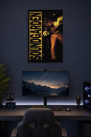 Soundgarden in a gaming desk setup above a monitor.