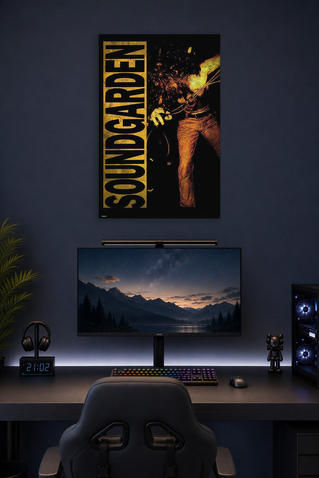 Soundgarden in a gaming desk setup above a monitor.