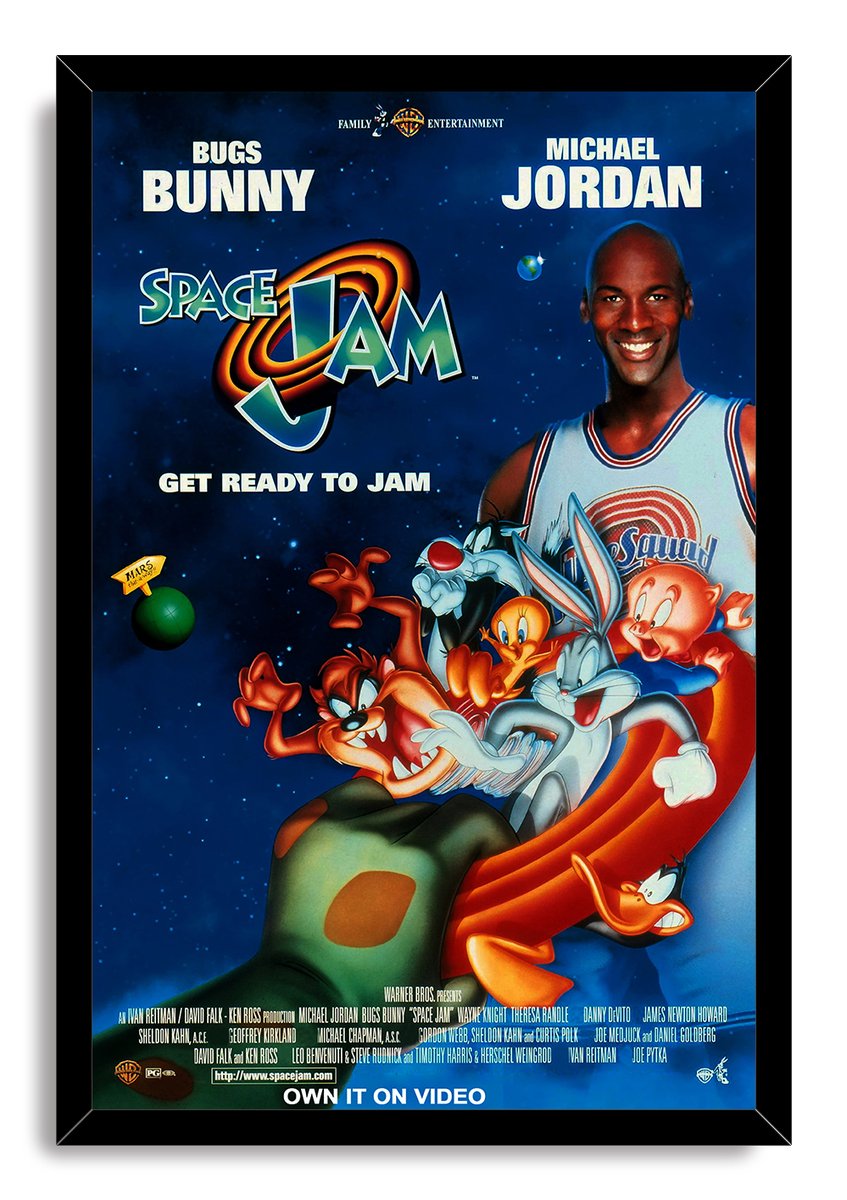 Space Jam framed wall art print with a black border, featuring Michael Jordan and Looney Tunes characters on a colorful rocket in space.