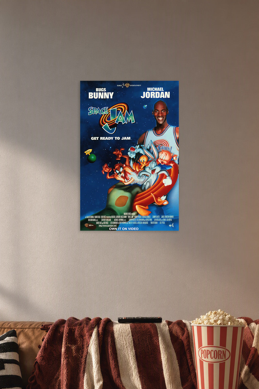 Space Jam Michael Jordan Bugs Bunny in a cozy movie room above a brown sofa with popcorn.