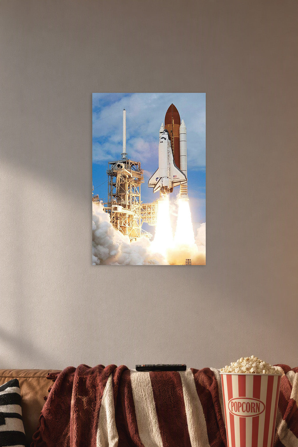 Space Shuttle Discovery Launch in a cozy movie room above a brown sofa with popcorn.