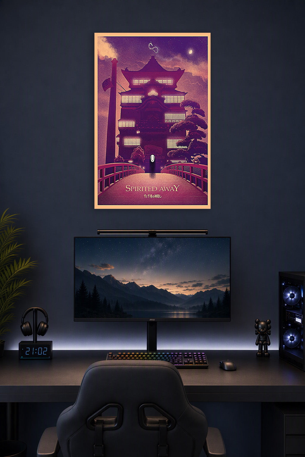 Spirited Away Bathhouse No-Face in a gaming desk setup above a monitor.