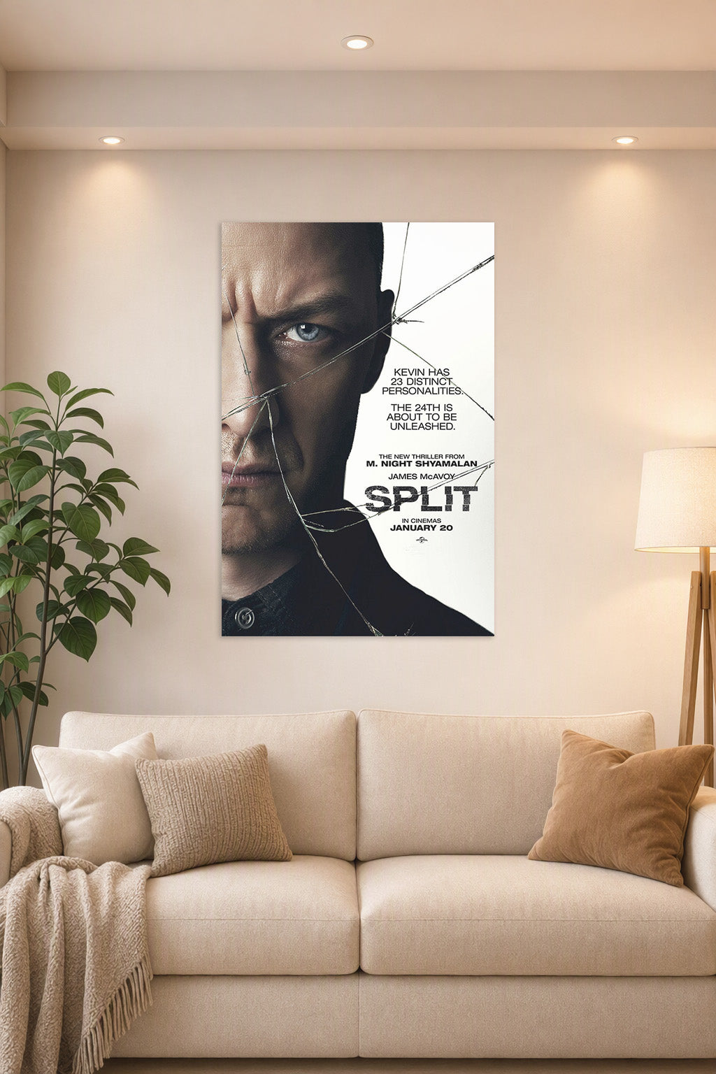 Split Movie Poster in a bright living room above a beige sofa.