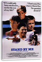 Stand By Me canvas wall art print featuring four boys, black text quotes, a glowing locomotive, and blue title lettering.