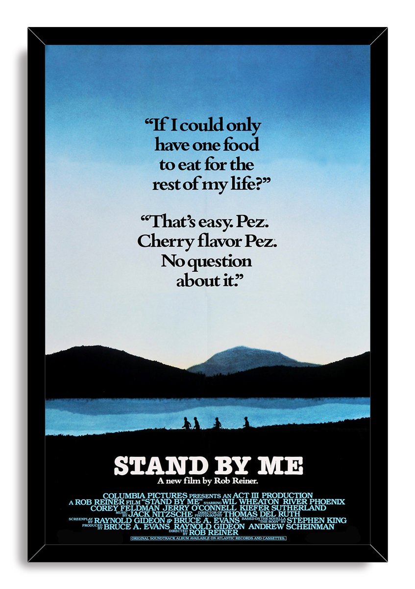 Stand By Me framed wall art print with Pez quote, blue sky and lake landscape, walking silhouettes, and black frame.