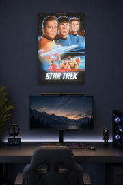 Star Trek Classic Series Crew in a gaming desk setup above a monitor.