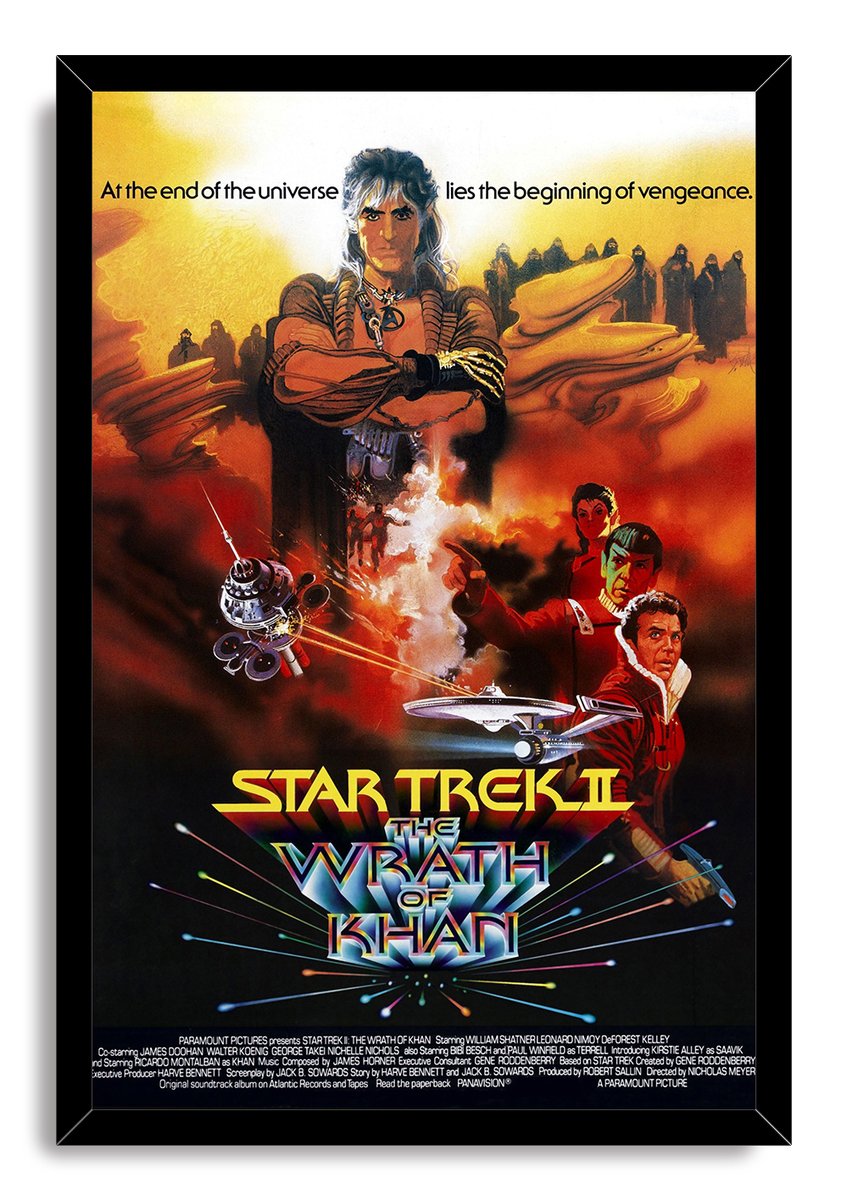Star Trek II The Wrath of Khan framed wall art print presents Khan and the crew amid spacecraft and fire tones in a black frame.