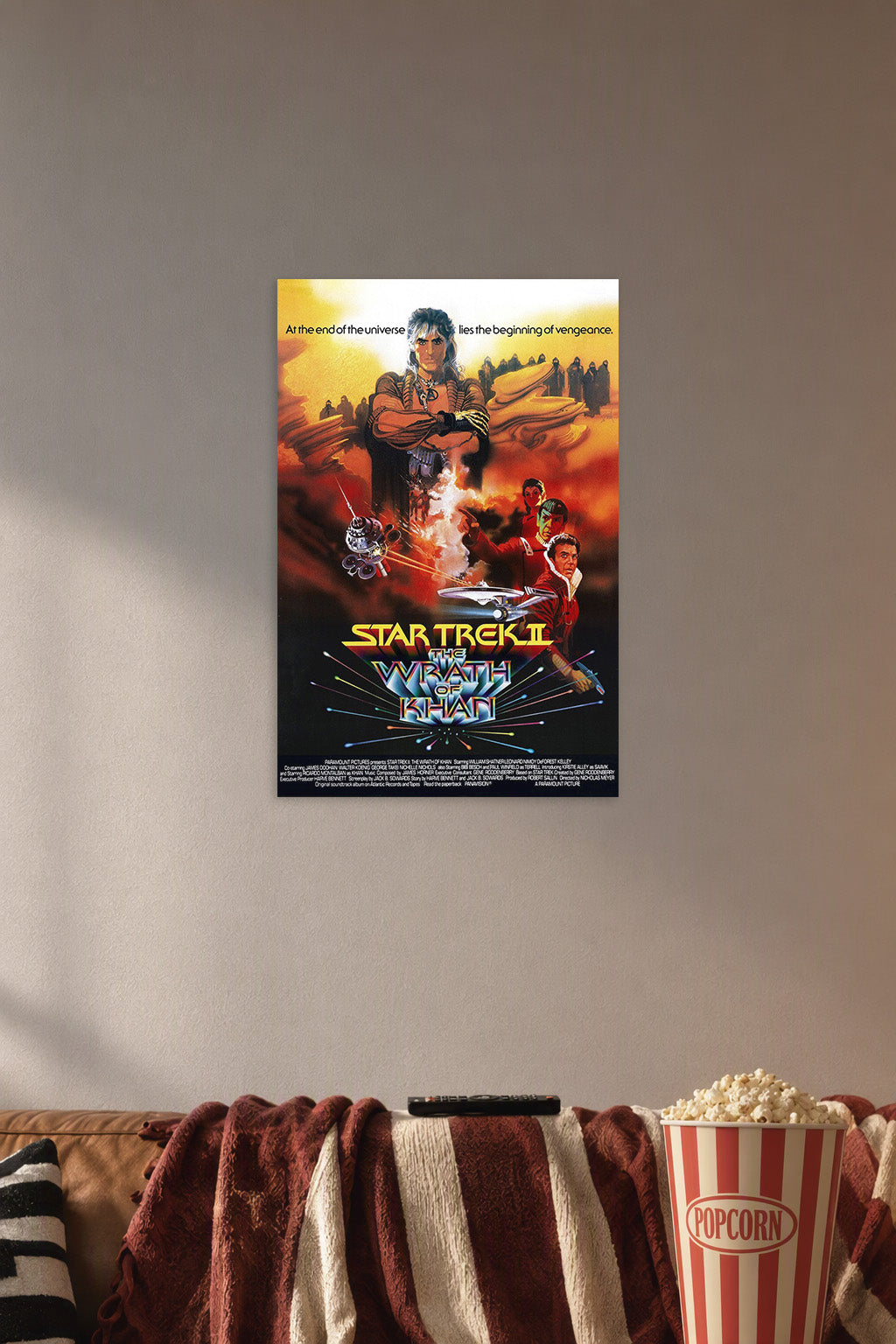 Star Trek II The Wrath of Khan Movie Poster in a cozy movie room above a brown sofa with popcorn.