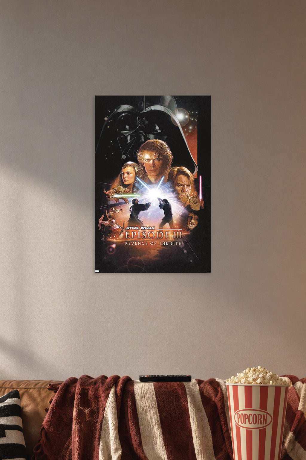 Star Wars: Revenge of the Sith Movie in a cozy movie room above a brown sofa with popcorn.