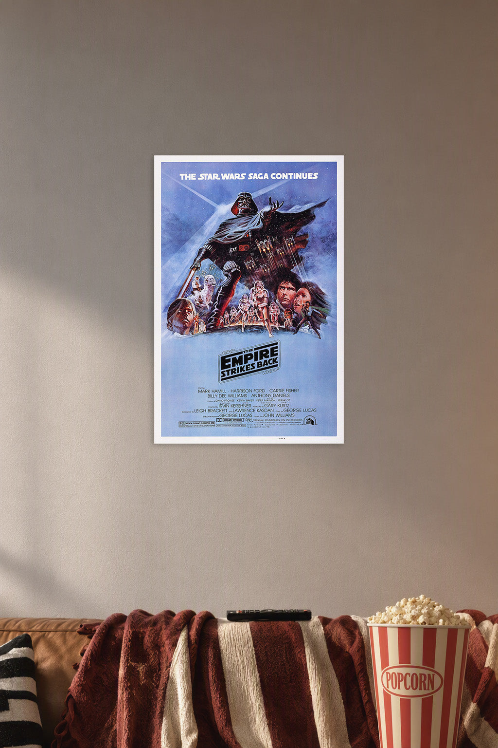 Star Wars: The Empire Strikes Back Darth Vader in a cozy movie room above a brown sofa with popcorn.