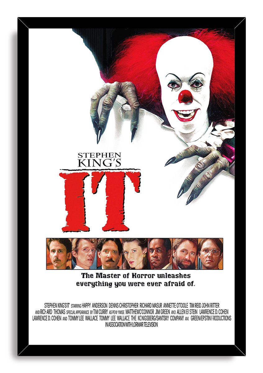 Pennywise IT framed wall art print presents the red-haired clown with long claws, bold red title text, and a cast portrait strip.