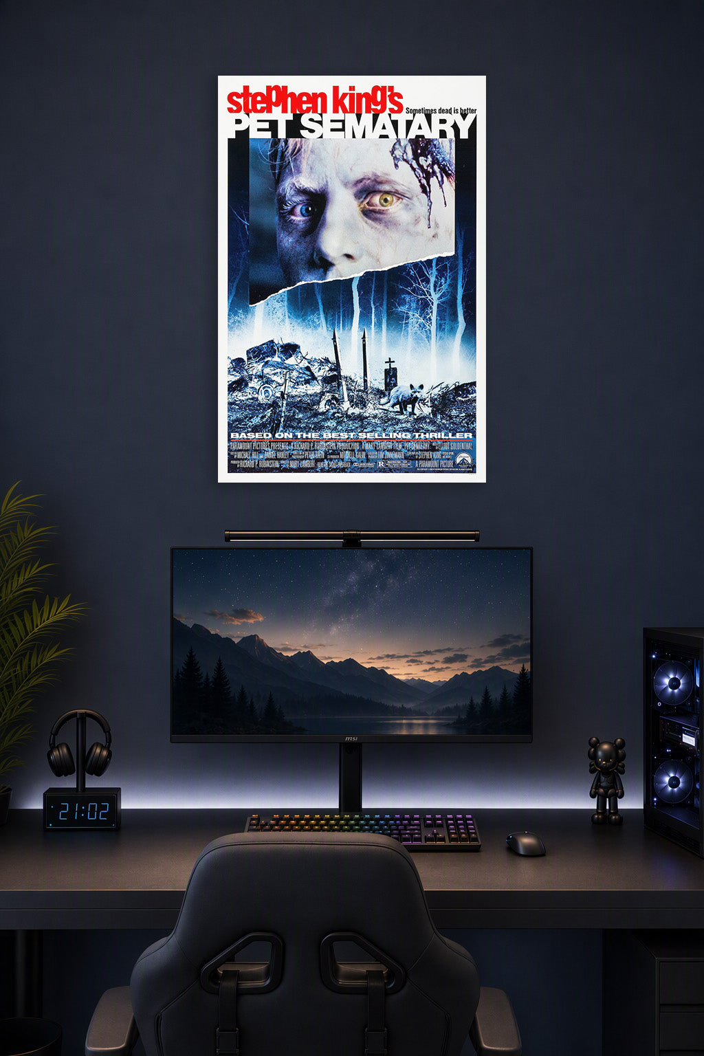 Stephen King's Pet Sematary Movie Poster in a gaming desk setup above a monitor.