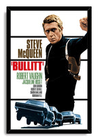Bullitt movie poster wall art print in a black frame, with Steve McQueen posed above a line of blue speeding cars.