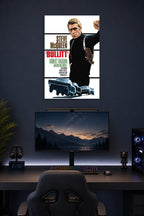 Steve McQueen Bullitt Movie in a gaming desk setup above a monitor.