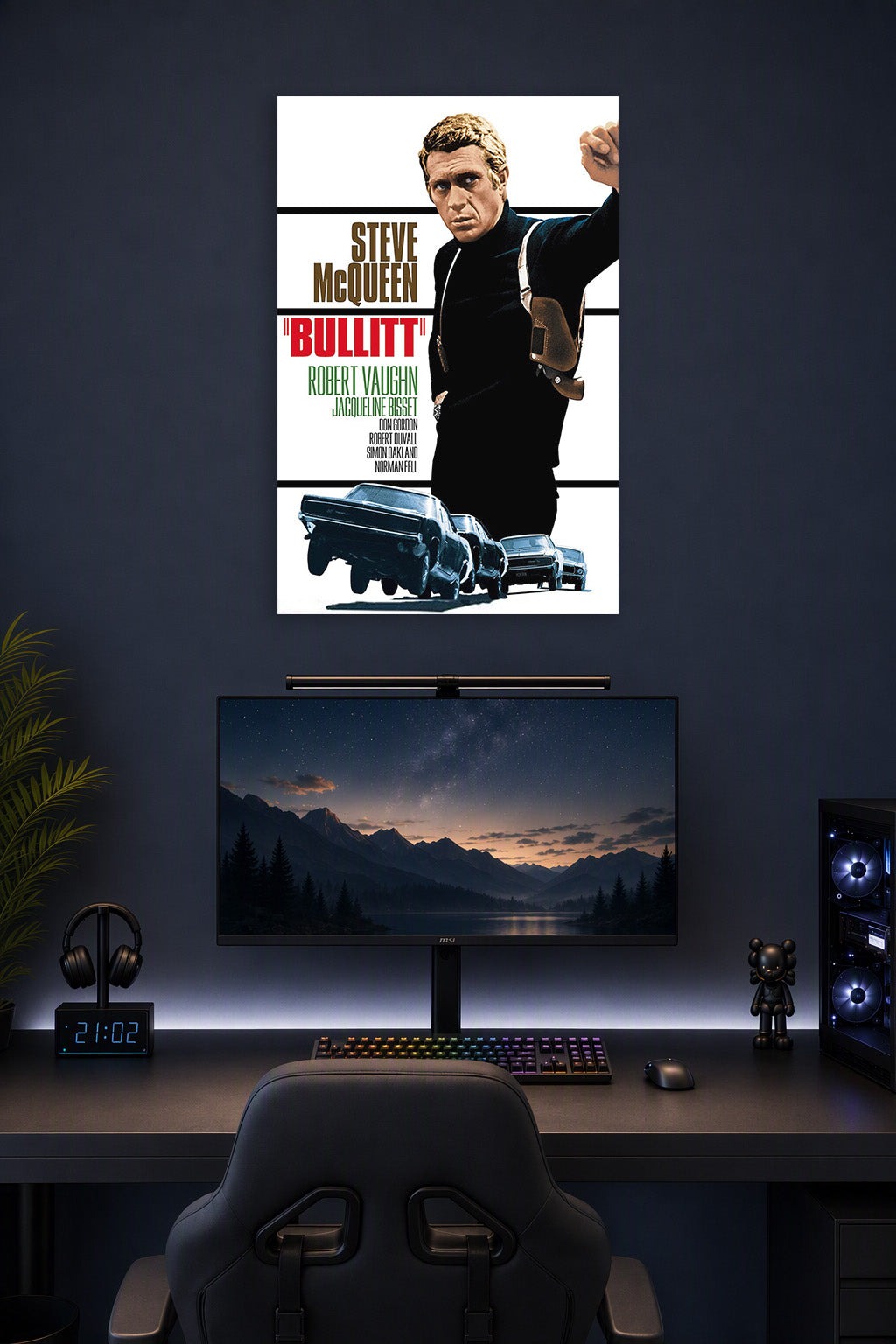 Steve McQueen Bullitt Movie in a gaming desk setup above a monitor.