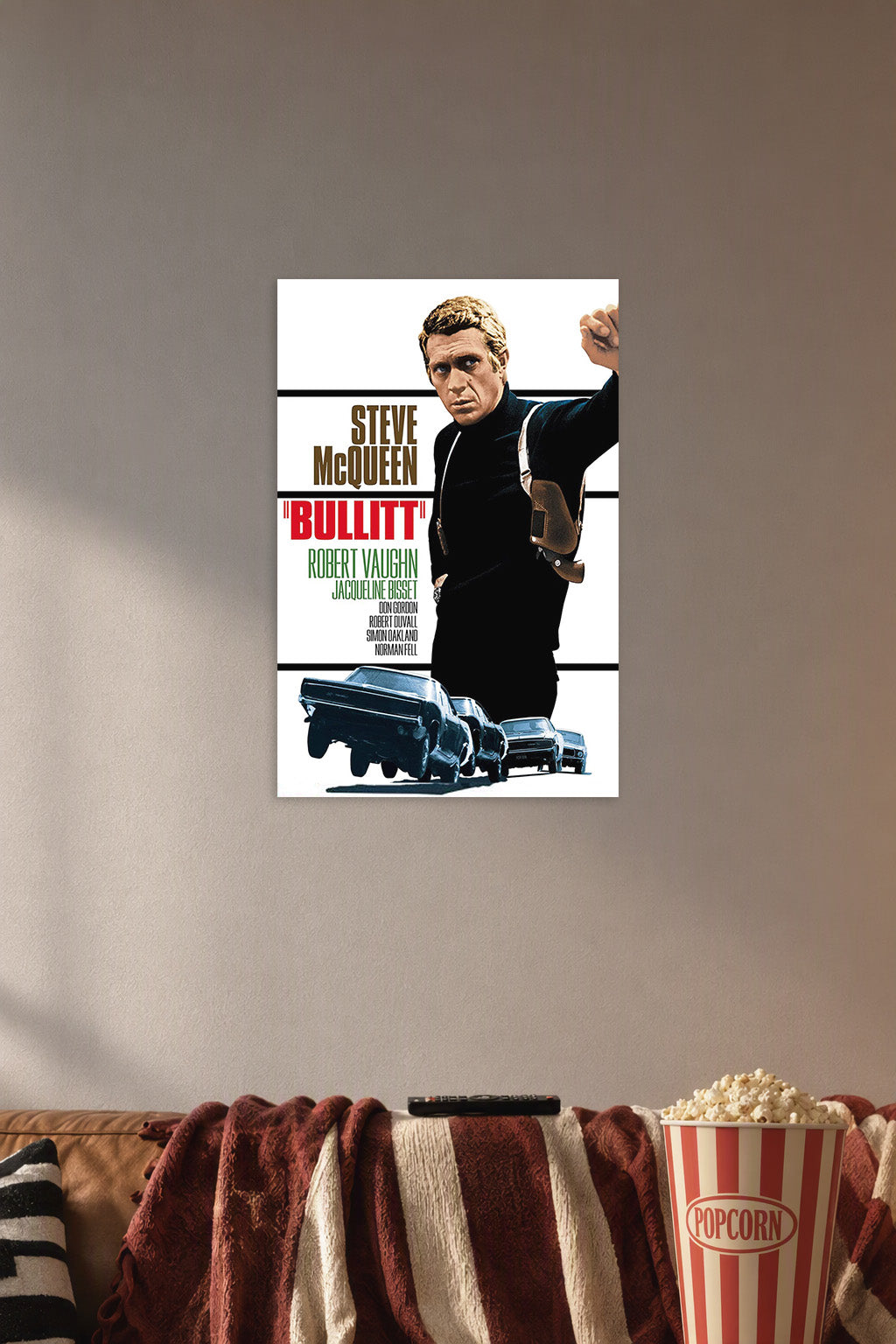 Steve McQueen Bullitt Movie in a cozy movie room above a brown sofa with popcorn.