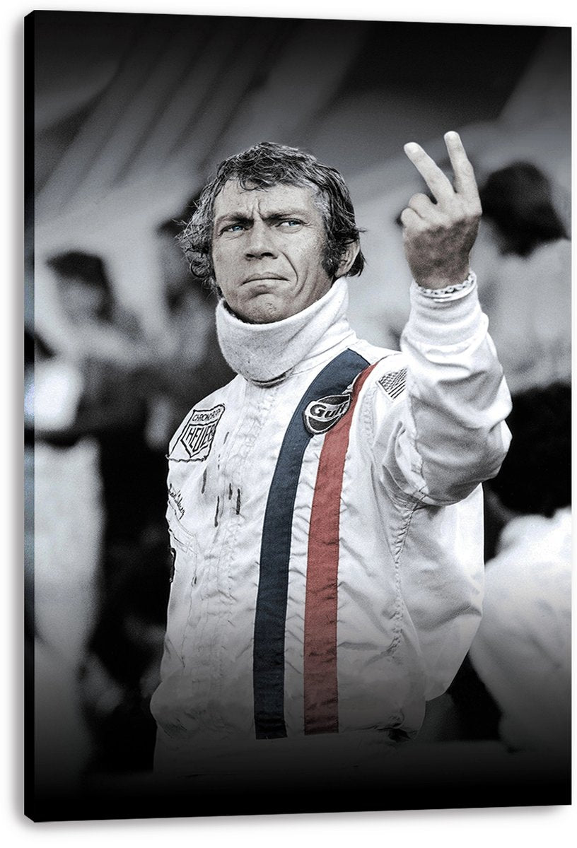 Steve McQueen canvas wall art print features a monochrome racer portrait in a white suit with blue and red chest stripes.