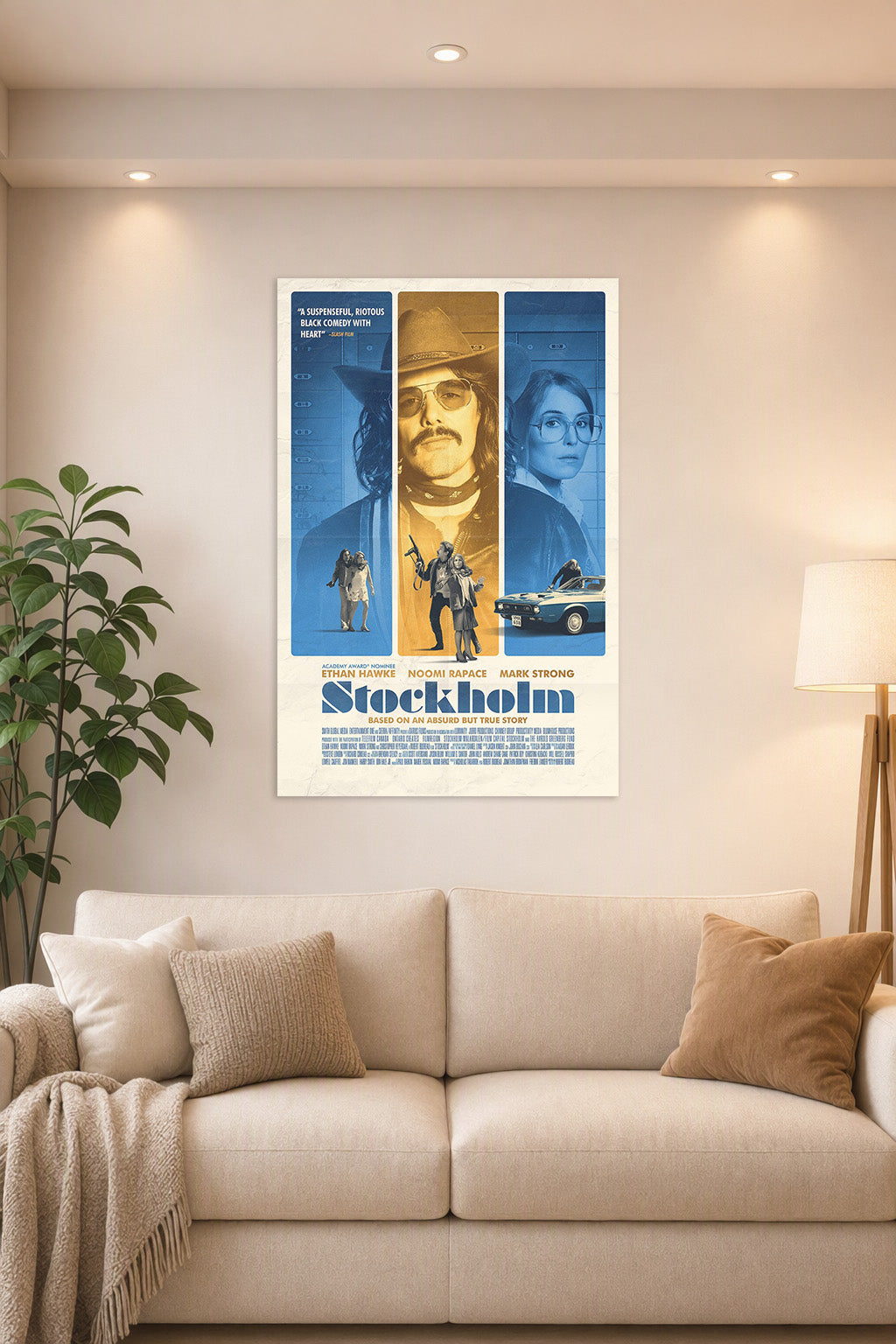 Stockholm Movie Poster in a bright living room above a beige sofa.