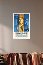 Stockholm Movie Poster in a cozy movie room above a brown sofa with popcorn.