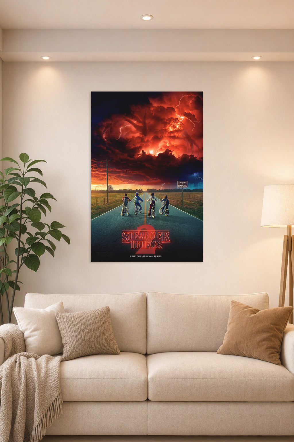 Stranger Things 2 in a bright living room above a beige sofa.