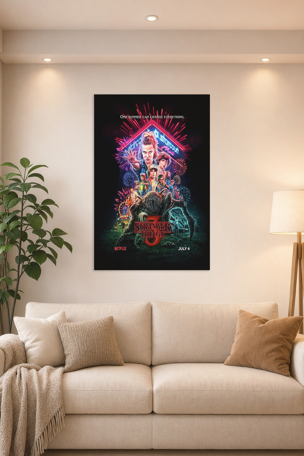 Stranger Things 3 in a bright living room above a beige sofa.