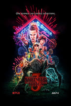 Stranger Things 3 poster features Eleven reaching forward above the cast, Starcourt neon, fireworks, and a looming monster.