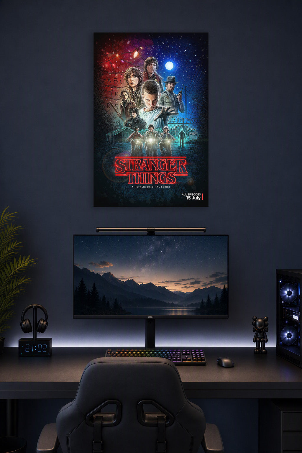 Stranger Things Cast in a gaming desk setup above a monitor.