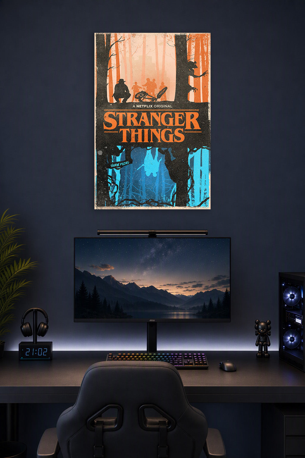 Stranger Things in a gaming desk setup above a monitor.