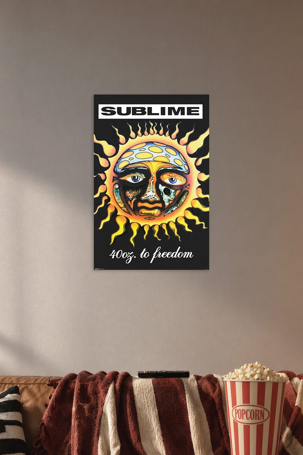 Sublime- 40 Oz. To Freedom Music in a cozy movie room above a brown sofa with popcorn.