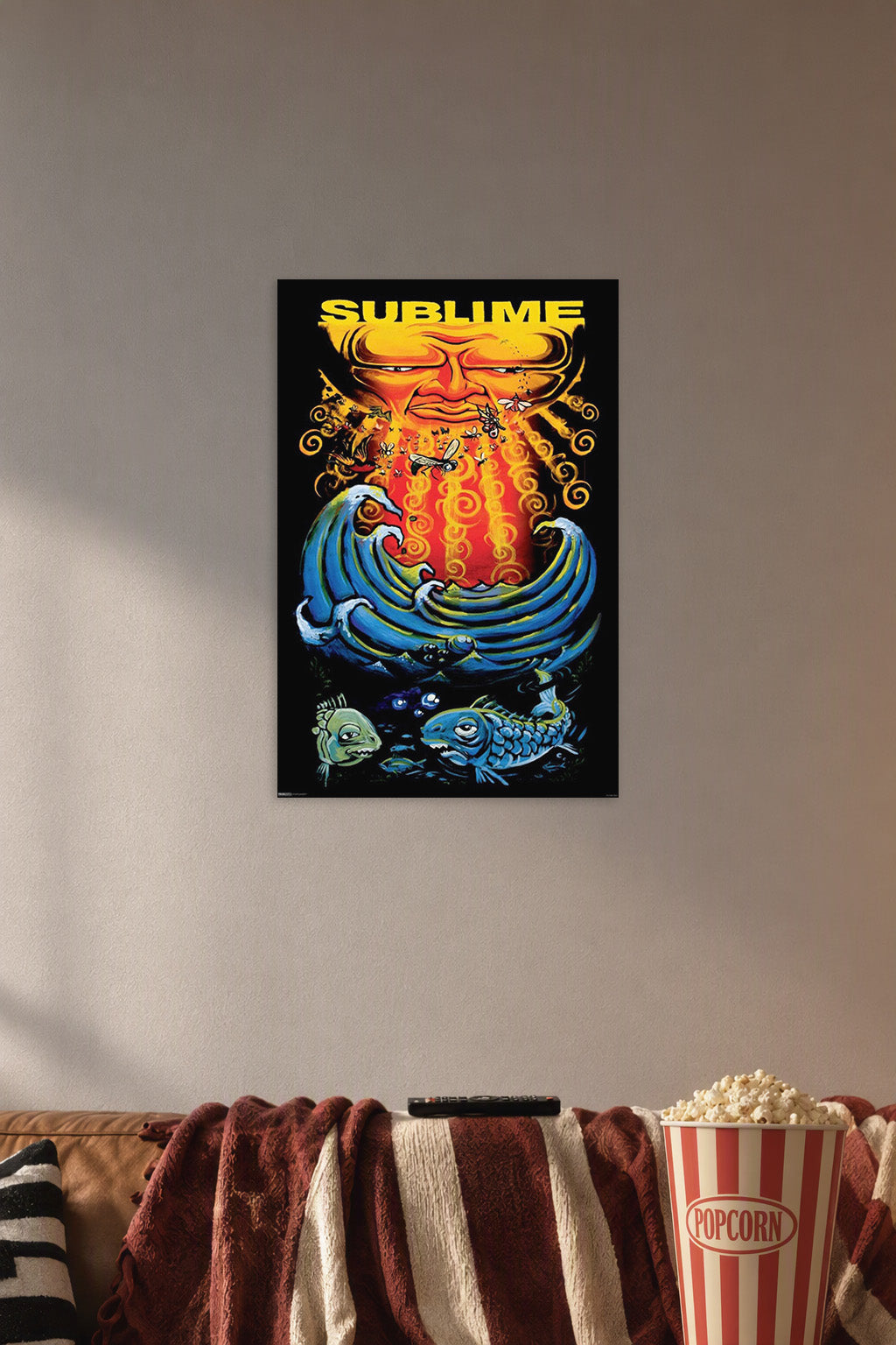 Sublime- Sun & Fish Music in a cozy movie room above a brown sofa with popcorn.