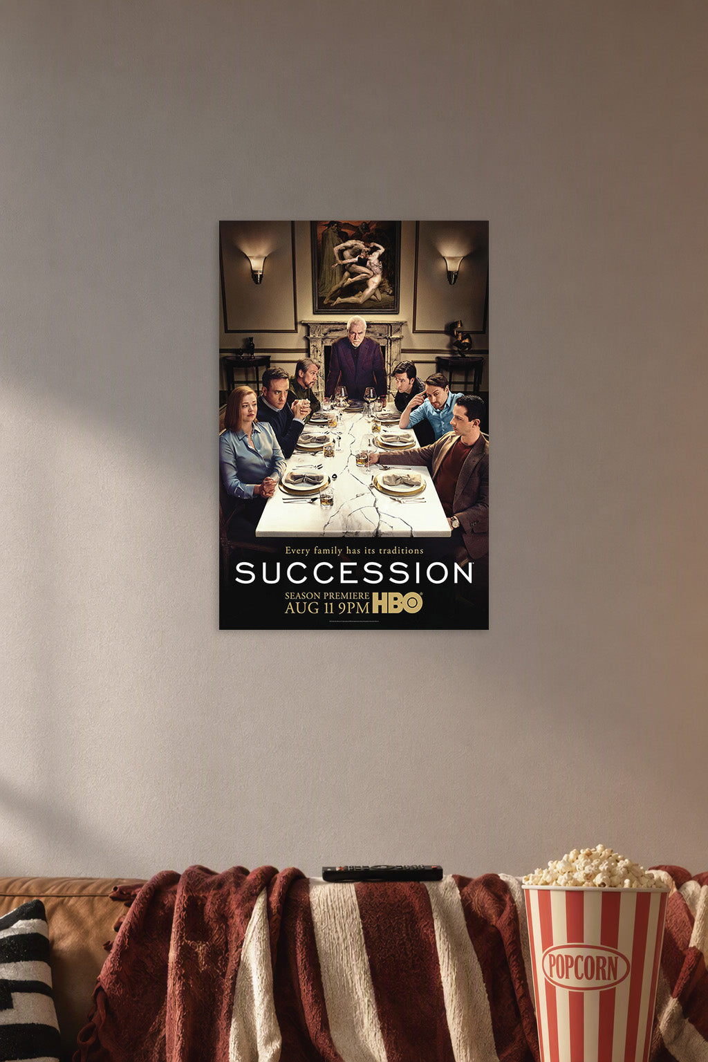 Succession TV Series Roy Family in a cozy movie room above a brown sofa with popcorn.
