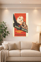 Sunset Boulevard Movie Poster in a bright living room above a beige sofa.
