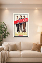 Superbad Movies in a bright living room above a beige sofa.